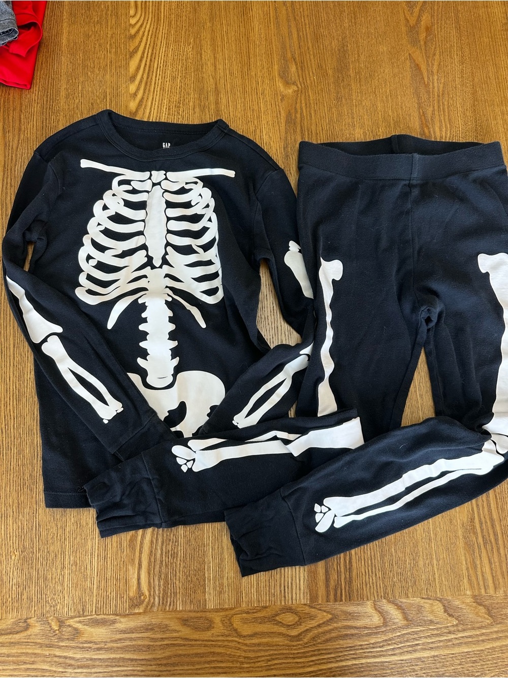 GAP Kids Black Pajama Set with White Skeleton Print
